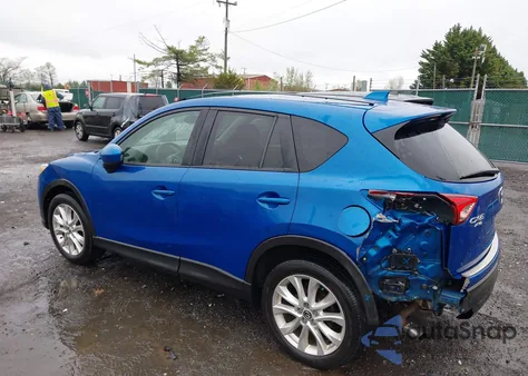 2013 Mazda Cx-5 Grand Touring z USA, uszkodzony, nr VIN JM3KE4DE0D0139257